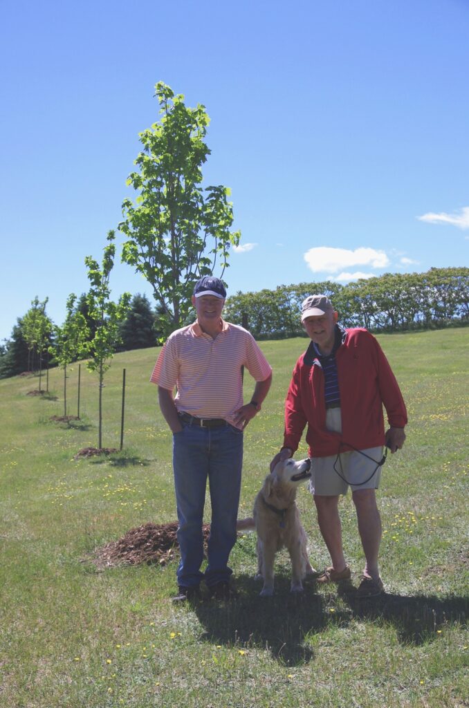 Landowner Jamie and MLF founder Ken Jewett with Ken's dog Amy