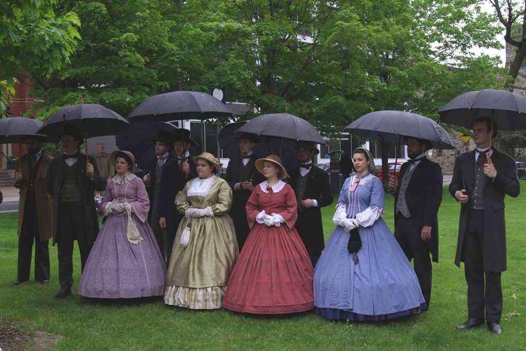 Actors in Confederation era dress.