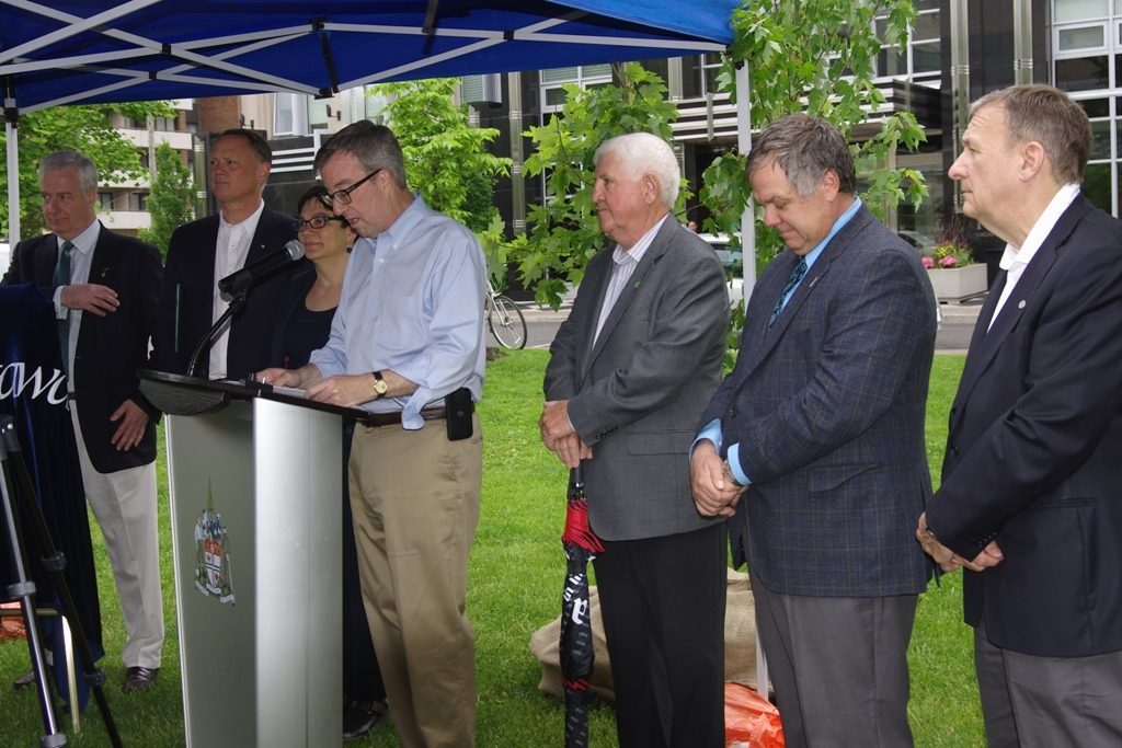 Mayor Jim Watson (speaking) with other event speakers.