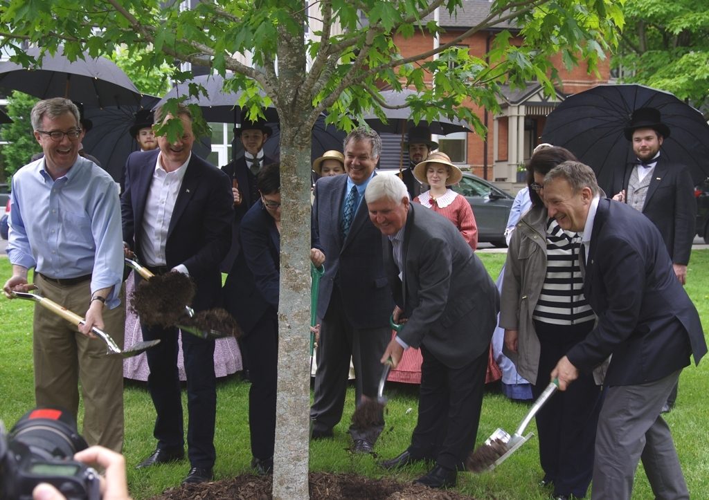 Mayor Jim Watson (left) and event speakers "tossing some dirt".